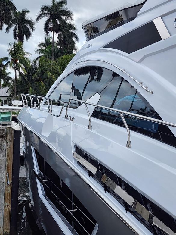 Motor yacht topsides and stainless detailed and polished from the waterline up