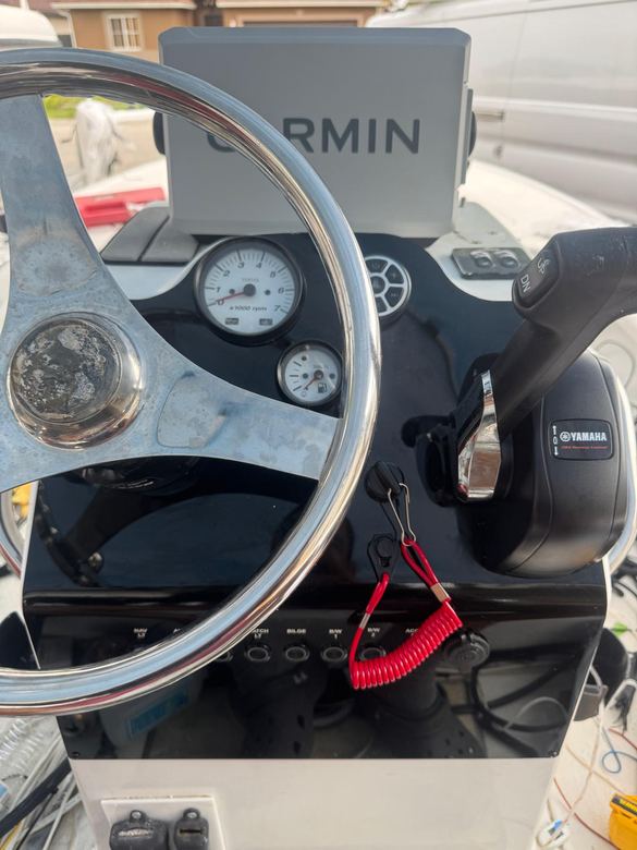 Helm rebuild with a Garmin display, Yamaha binnacle controls, tachometer and new push-button panel