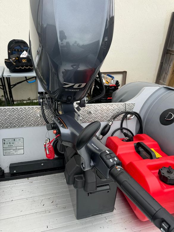 Yamaha 70 outboard rigged on a tender with new controls, fuel line and battery box